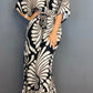 🔥 Vintage jumpsuit with floral pattern and ruffled sleeves